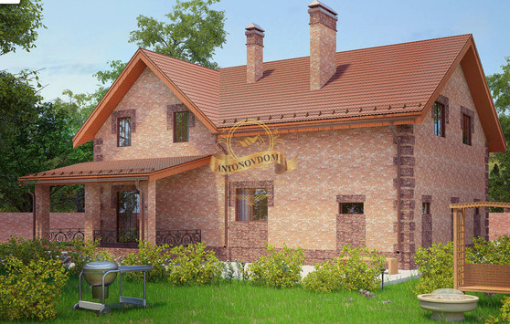 Дом из пеноблоков с мансардой и сложной крышей